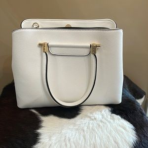 White purse with crossbody strap